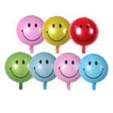 Smiley face foil balloon