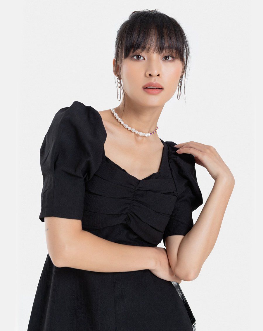 Đầm lửng tay phồng nhúng ngực
