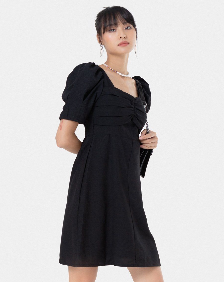 Đầm lửng tay phồng nhúng ngực