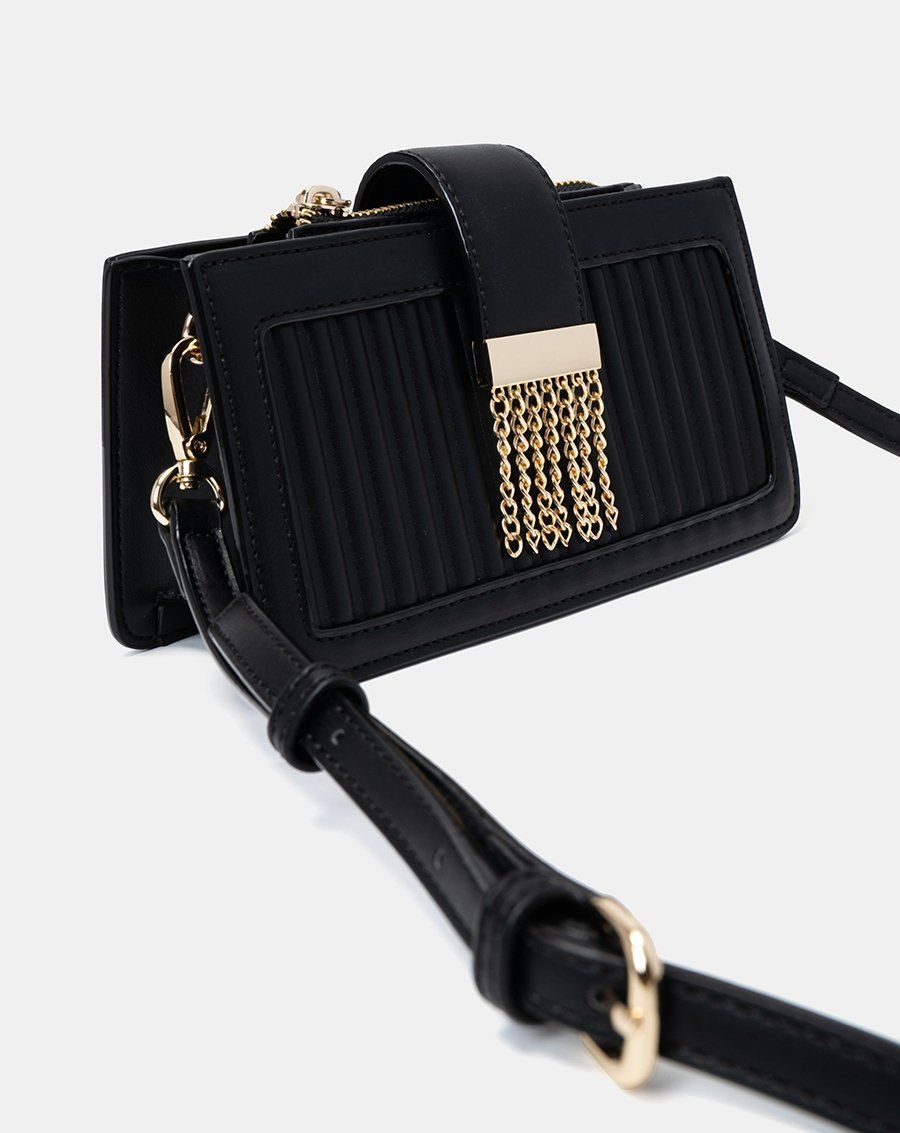 Túi xách nhỏ buckle flap trang trí khóa tua rua