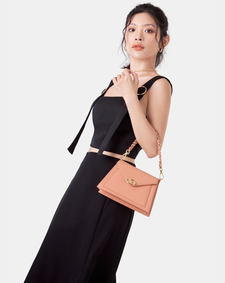 Túi xách nhỏ tay cầm xoắn khoá evil eye