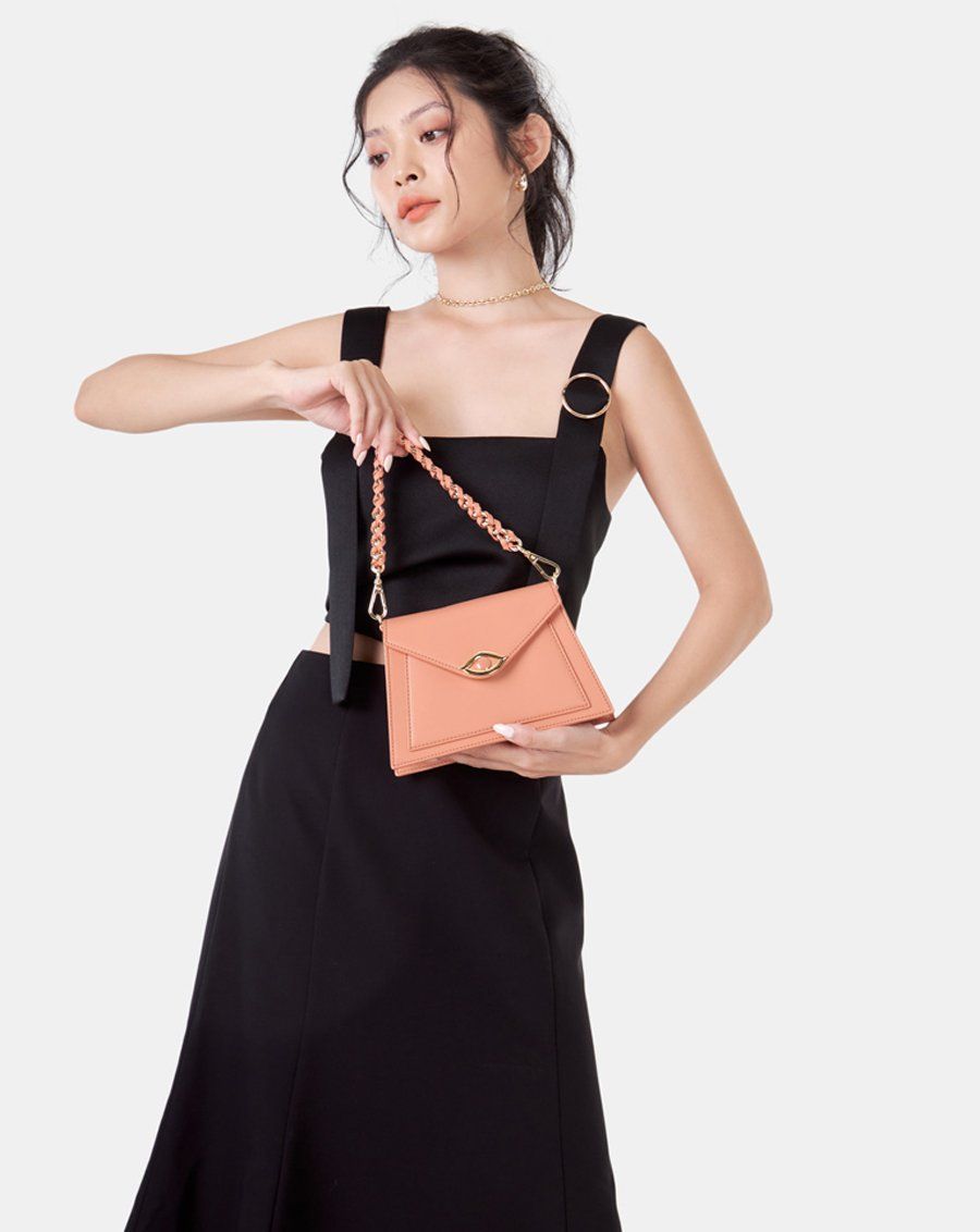 Túi xách nhỏ tay cầm xoắn khoá evil eye