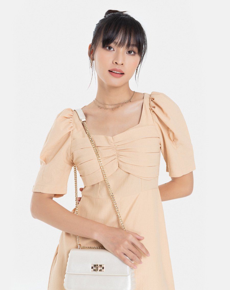 Đầm lửng tay phồng nhúng ngực