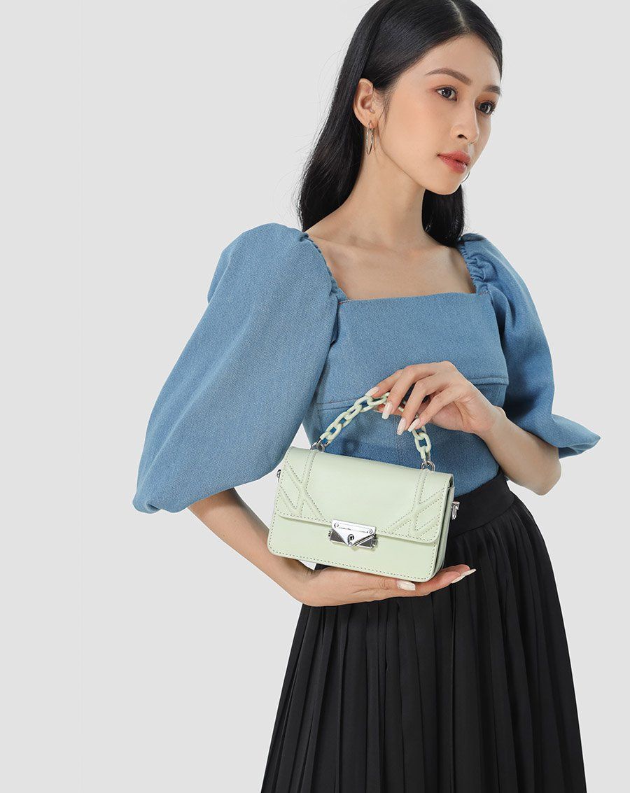 Túi xách nhỏ cut-out khoá trang trí