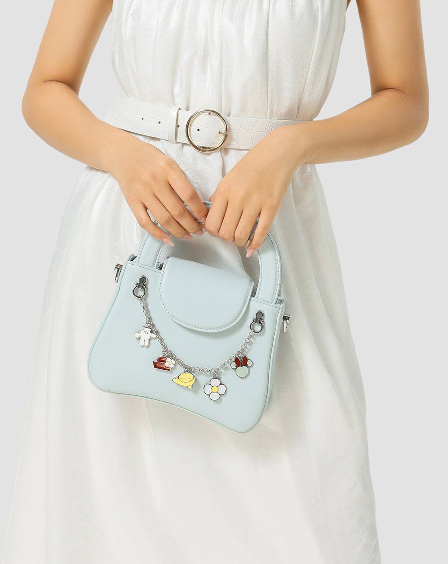 Túi xách nhỏ Minnie gắn charm minnie