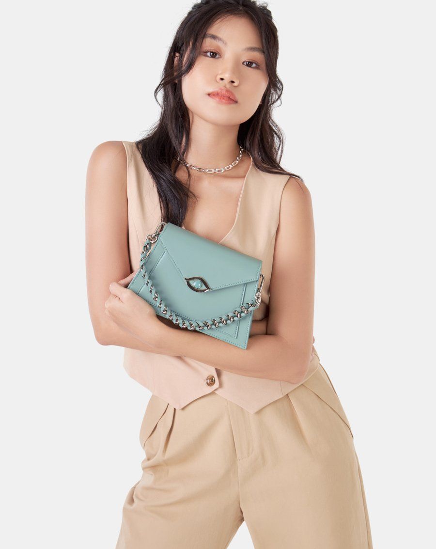 Túi xách nhỏ tay cầm xoắn khoá evil eye