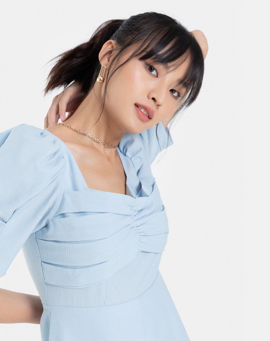 Đầm lửng tay phồng nhúng ngực