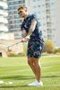 Áo golf nam tay ngắn 53379701 in hoa nhiệt đới xanh-cam | Puma