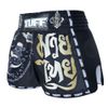 Quần TUFF Muay Thai Boxing Shorts New Retro Style Black Singha Yantra with War Flag