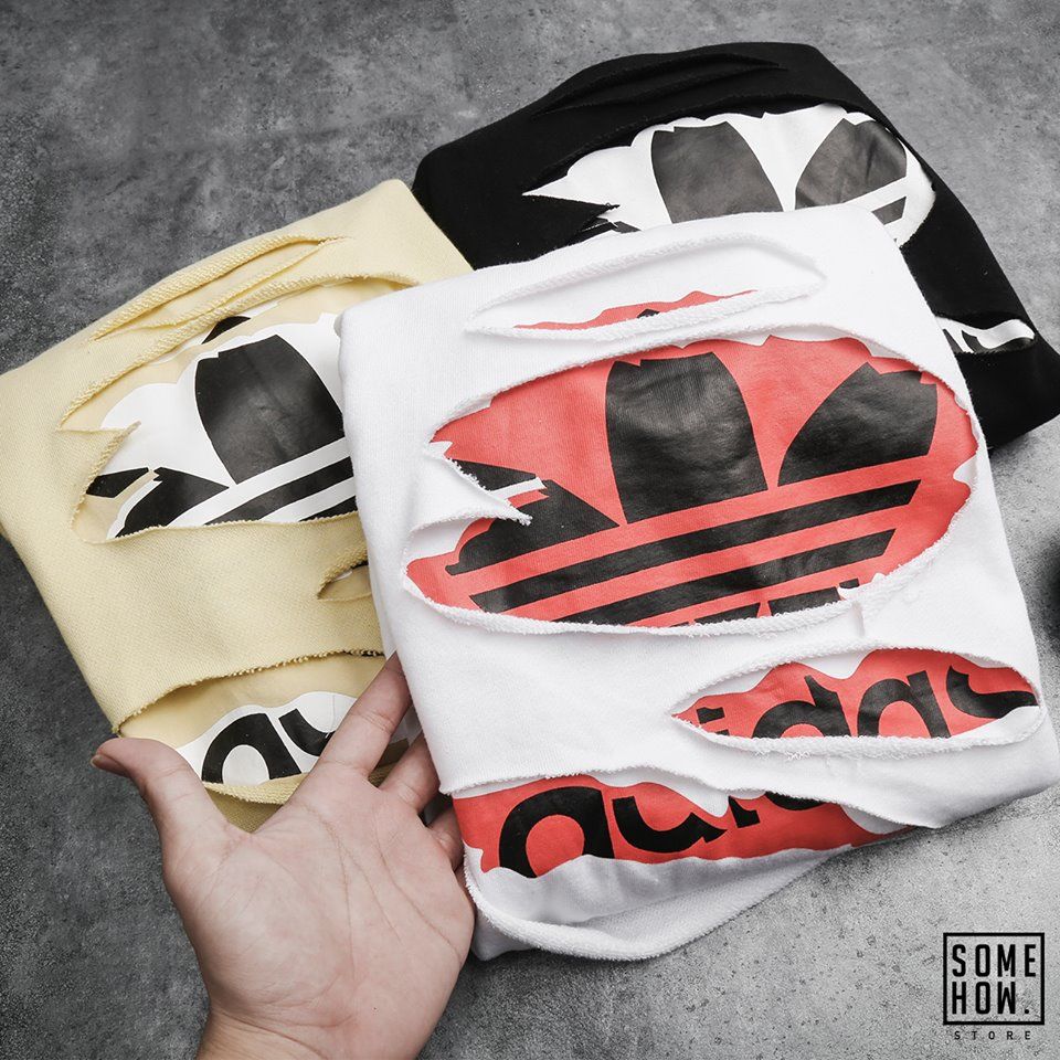 Sweater Das Logo Phối Rách
