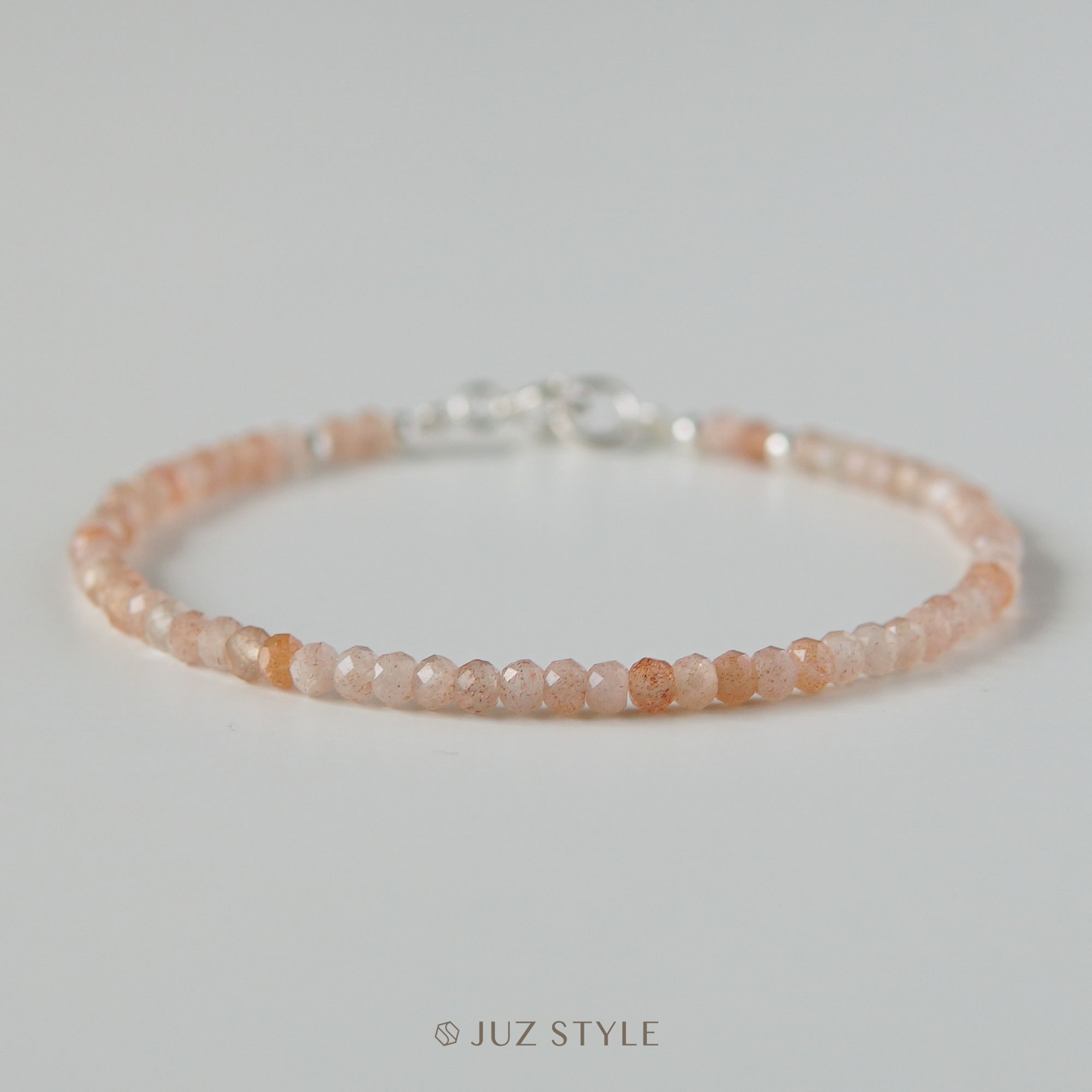 Vòng tay đá Peach moonstone 3x2mm