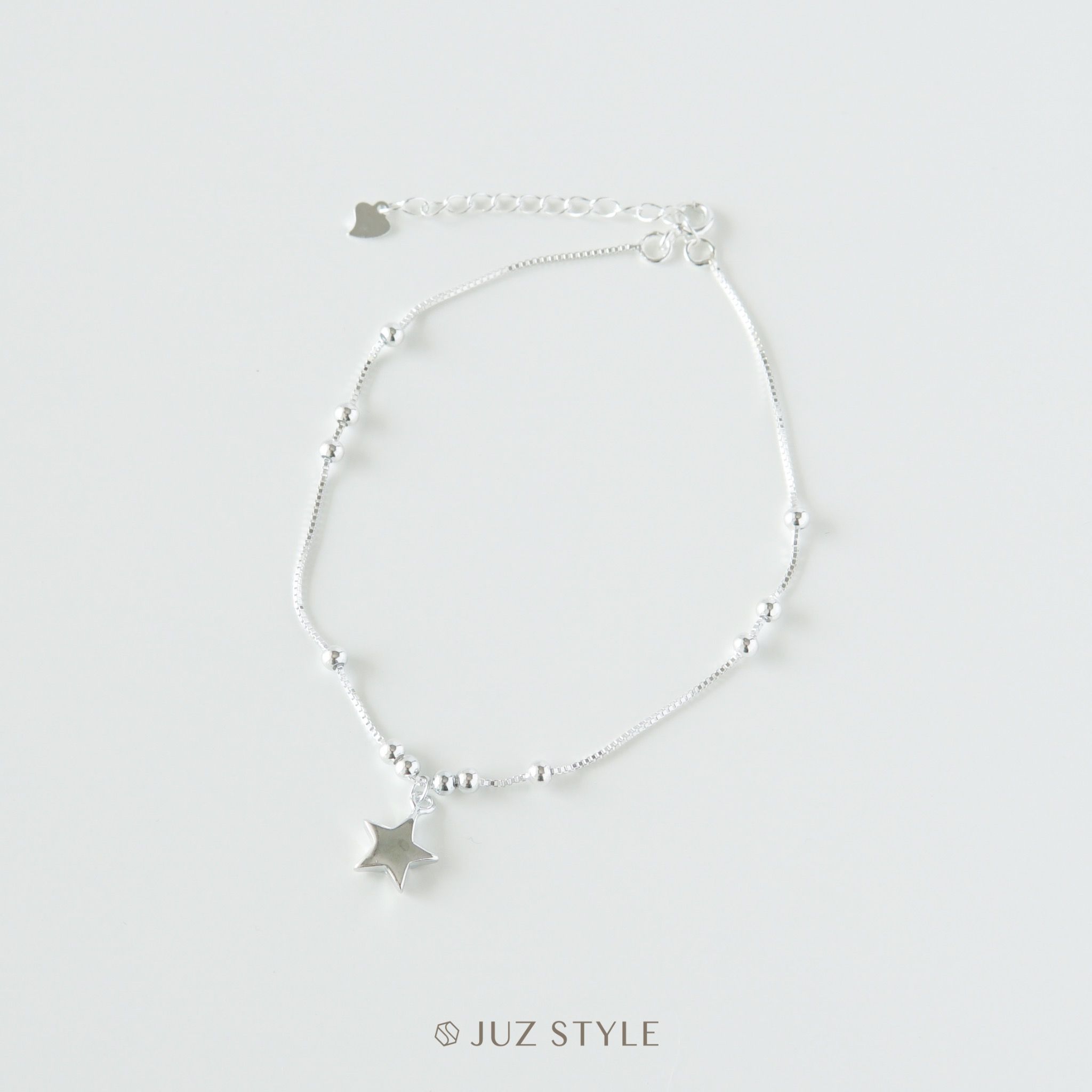 Lắc chân bạc The star