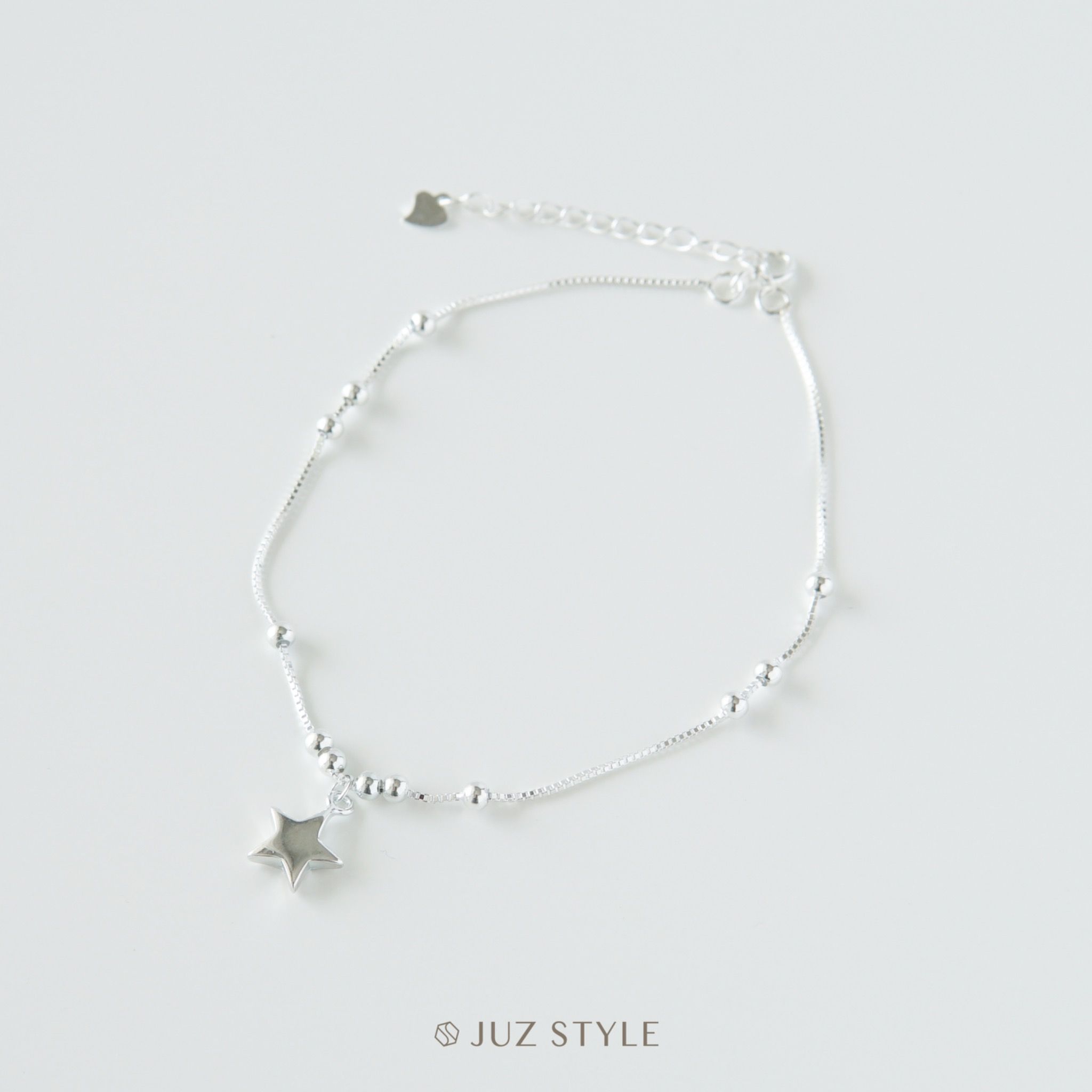 Lắc chân bạc The star