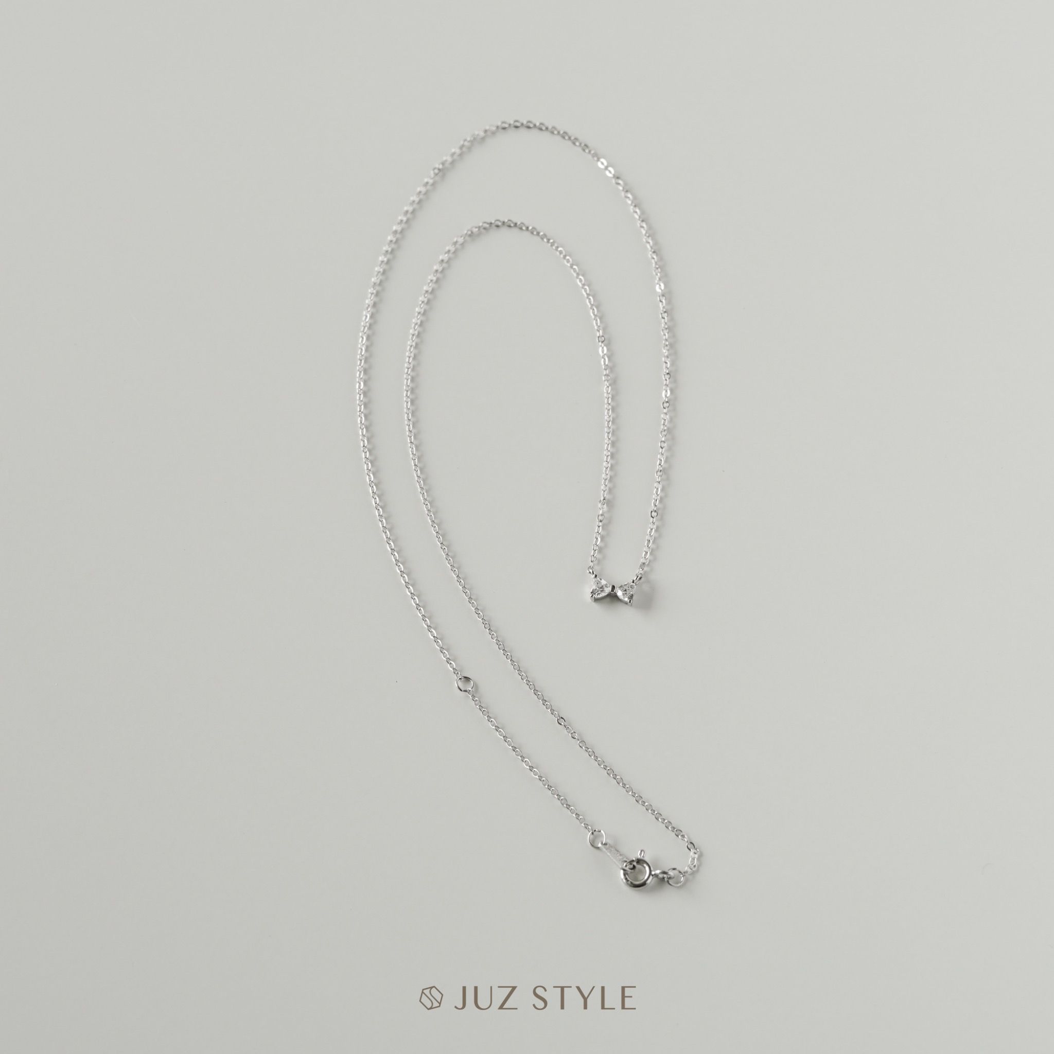 Dây chuyền bạc Cz Bow