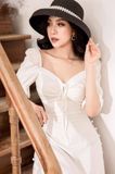 Đầm thiết kế trắng cổ vuông tay bo rút ngực