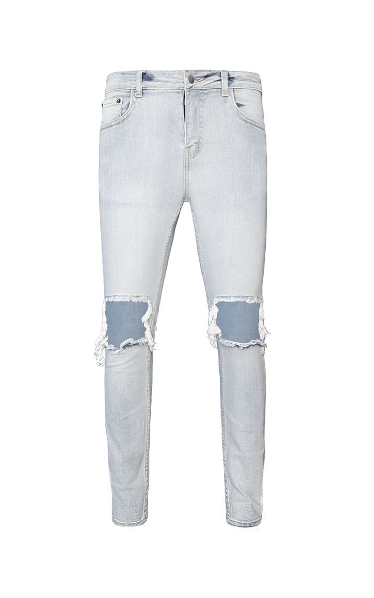 Skinny Jeans With Knee Rips In Blue