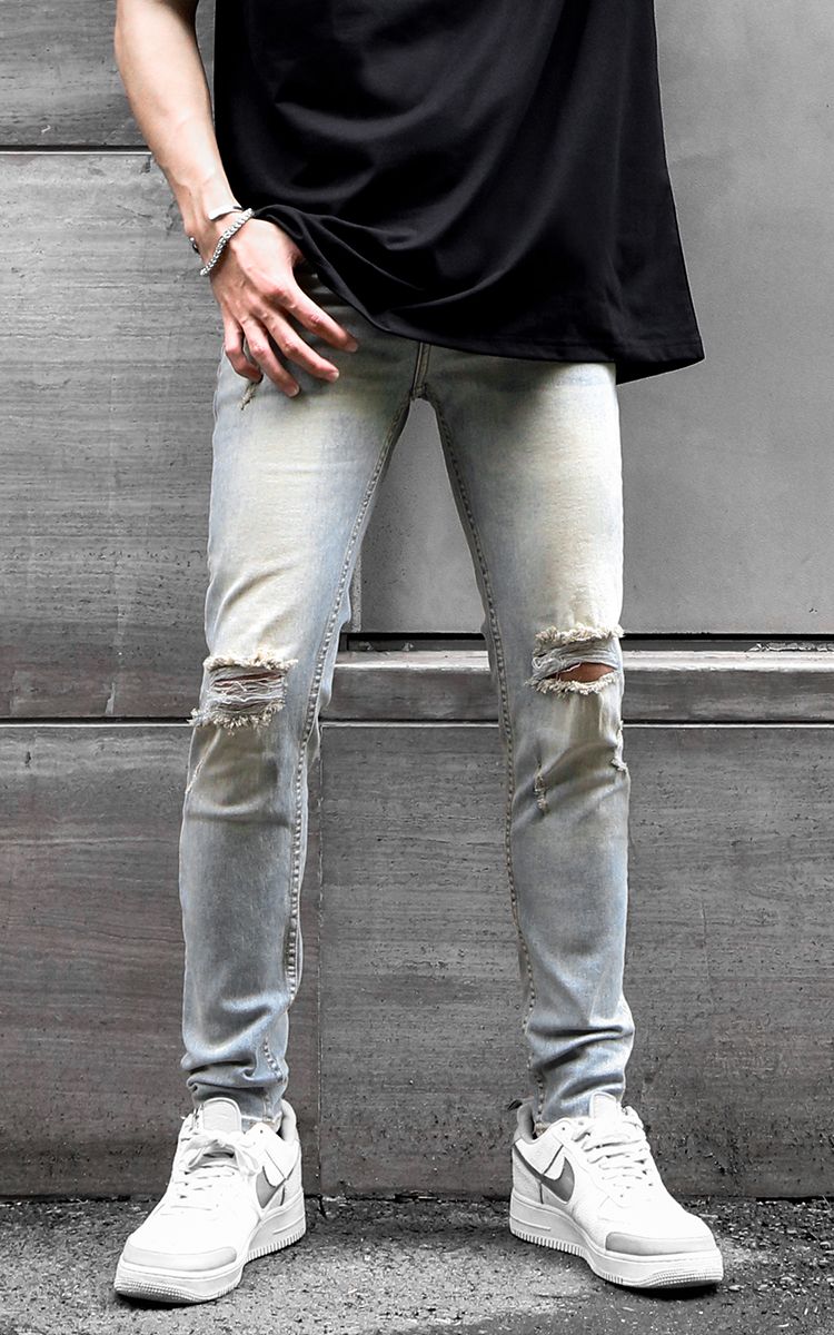 Skinny Jeans With Knee Rips In Blue