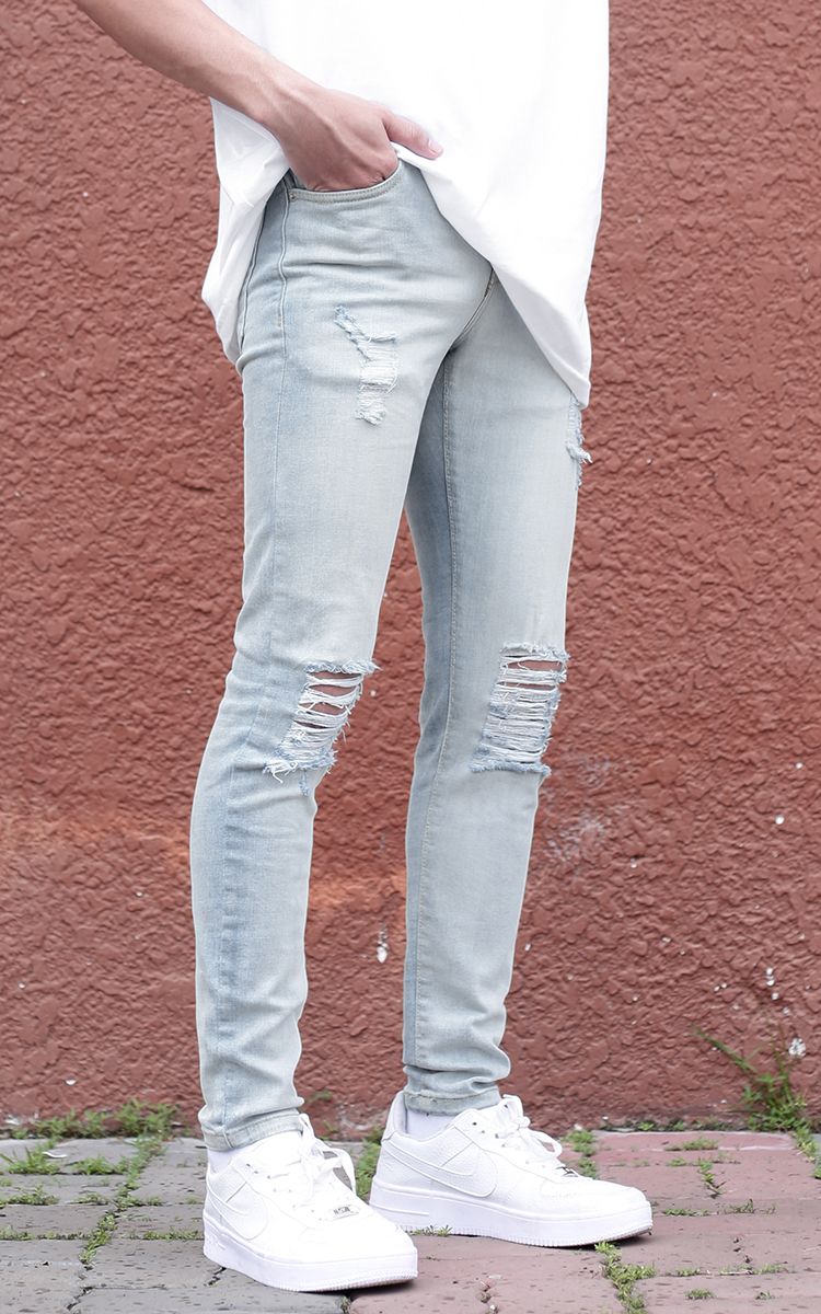 Skinny Jeans With Knee Rips In Blue