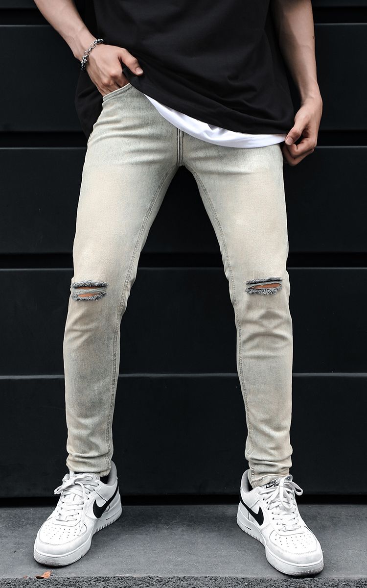 Skinny Jeans With Knee Rips In Blue