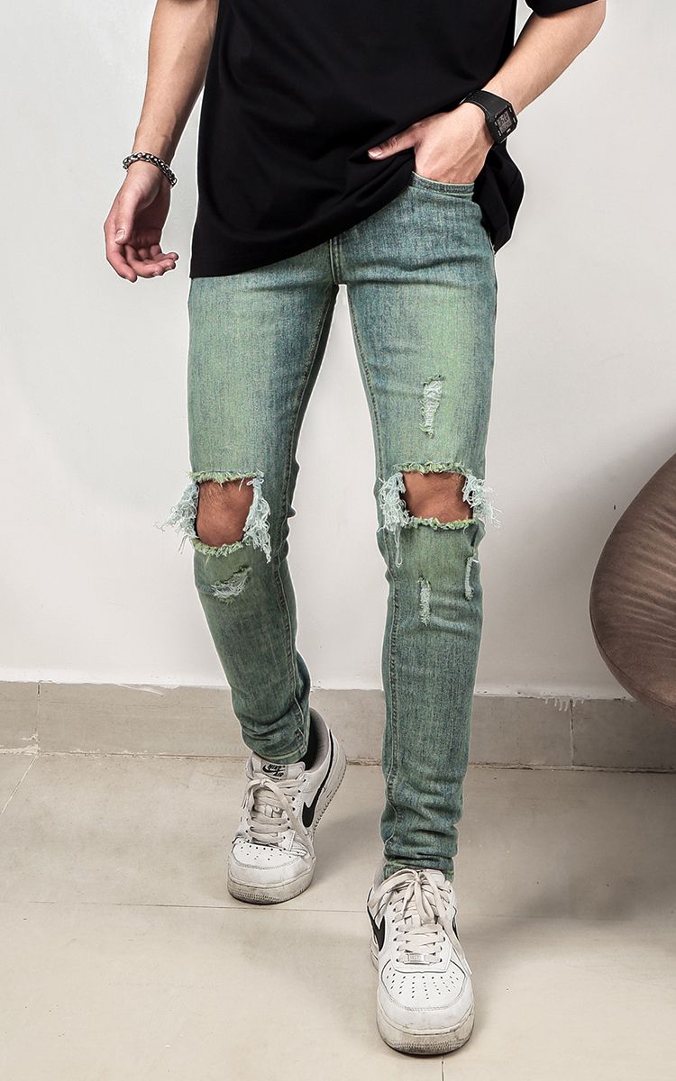 Skinny Jeans With Knee Rips In Mid Wash Blue