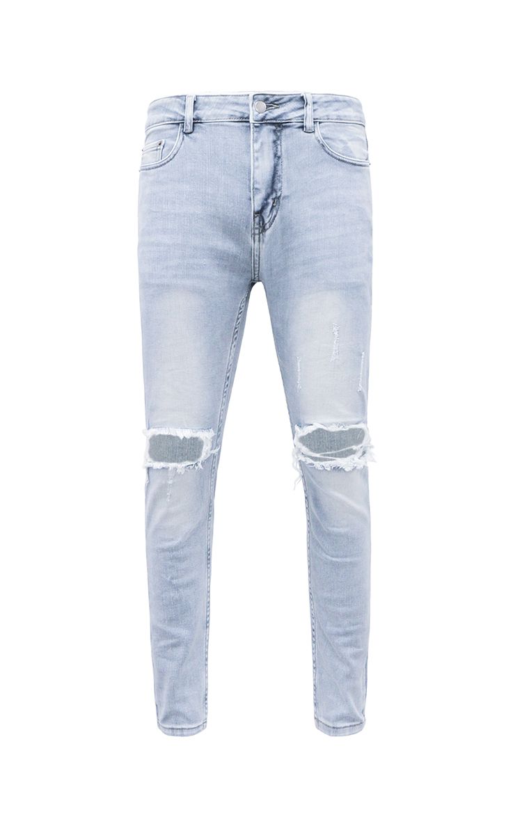 Skinny Jeans With Knee Rips In Mid Wash Blue