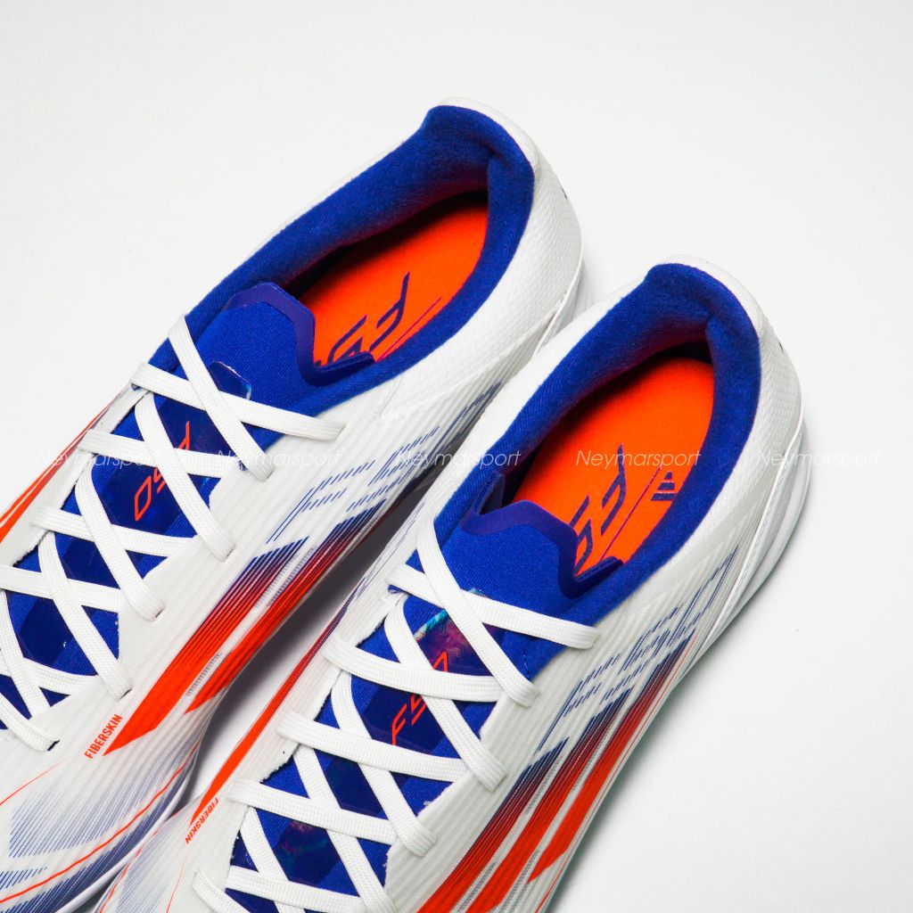 Giày đá bóng adidas F50 League TF Advancement - Footwear White/Solar Red/Lucid Blue IF1343