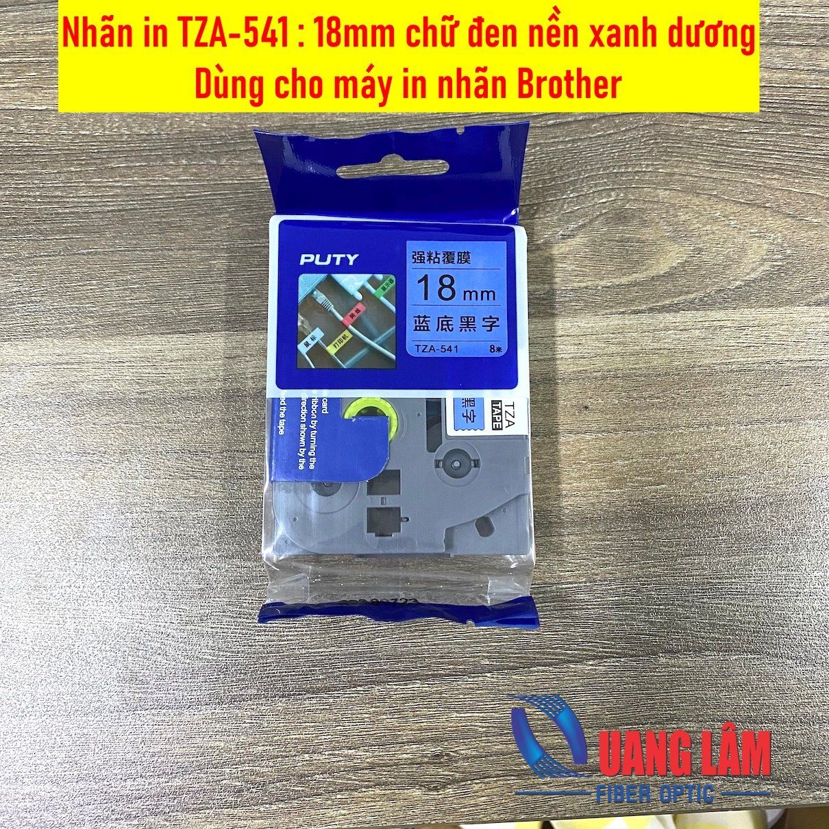 Nhãn in TZA-541, Loại tiêu chuẩn, Chữ đen trên nền xanh dương, Khổ 18mmx8M