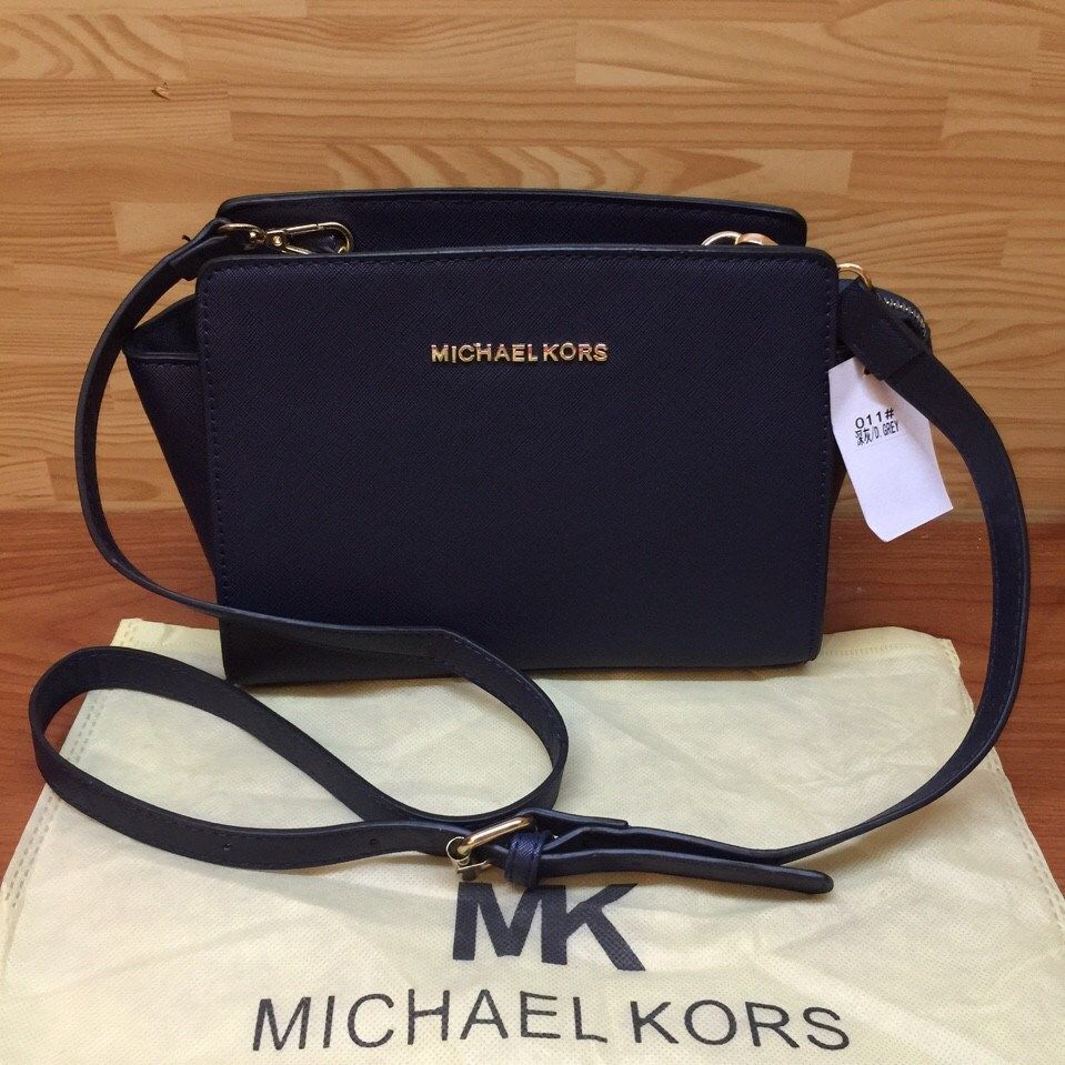 Túi xách nữ Michael Kors dạng vuông dây đeo da jetset 000345 màu nâu