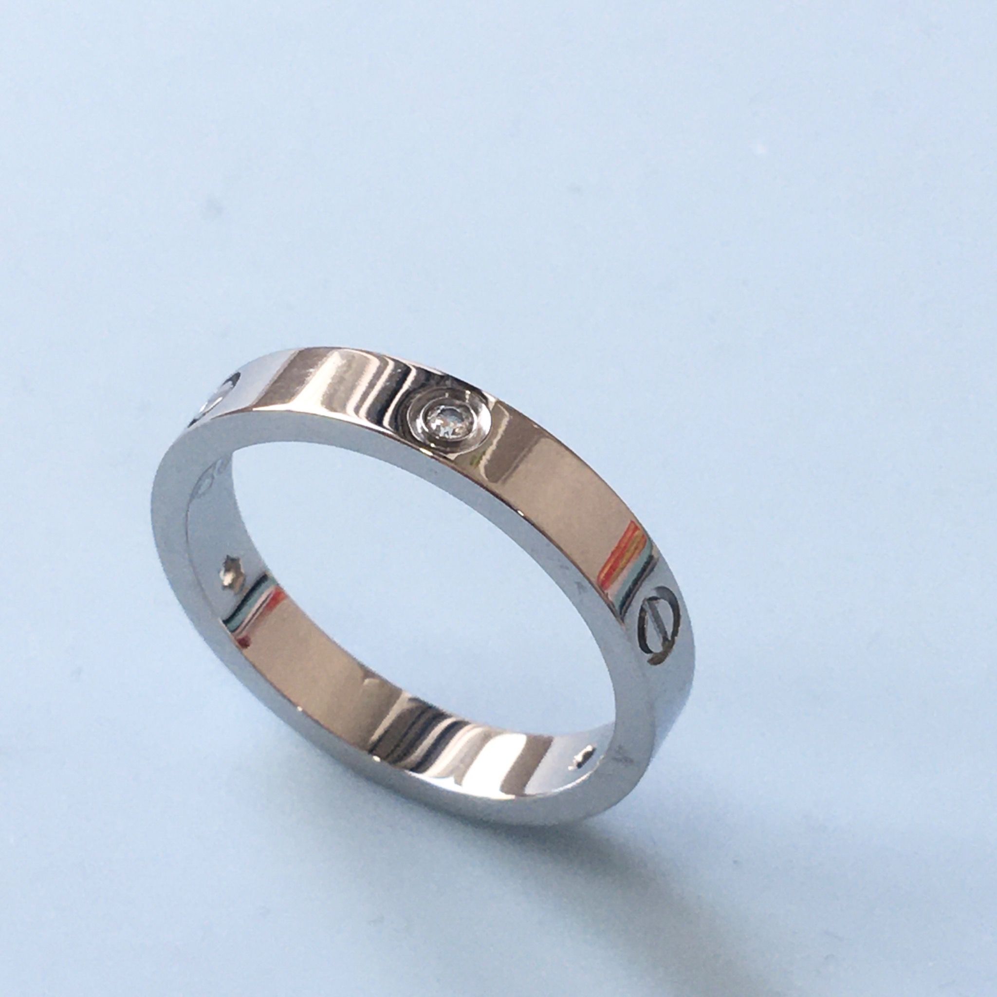 Nhẫn Nam, Nữ Titan Cao Cấp - Cartier Màu Trắng Pha Lê (AE)