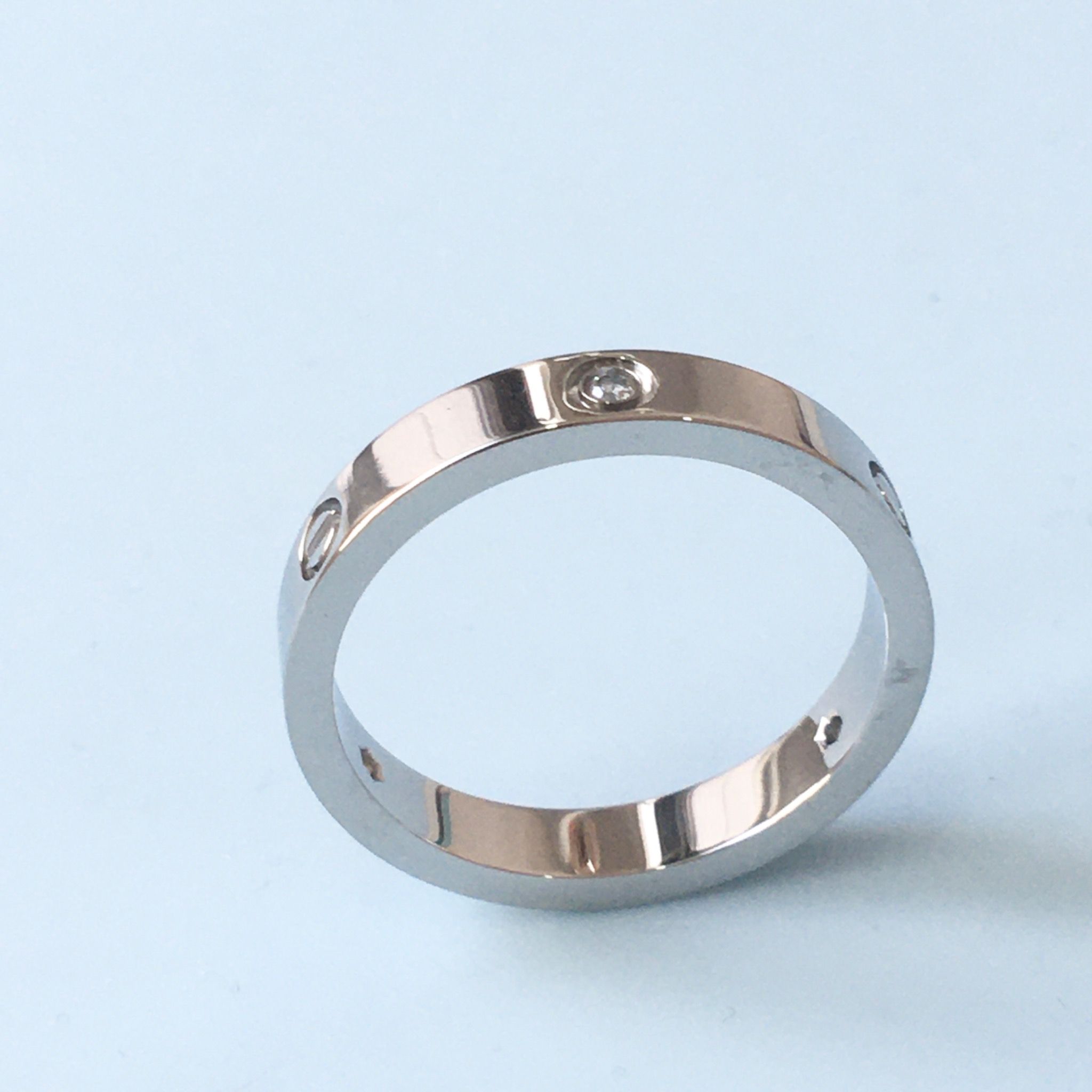 Nhẫn Nam, Nữ Titan Cao Cấp - Cartier Màu Trắng Pha Lê (AE)