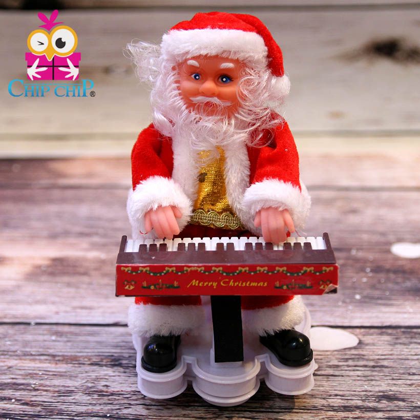 ông noel nhạc ngồi đàn Piano