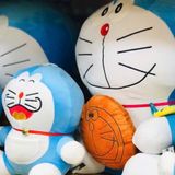 Thú Bông Doraemon Ôm Bánh 