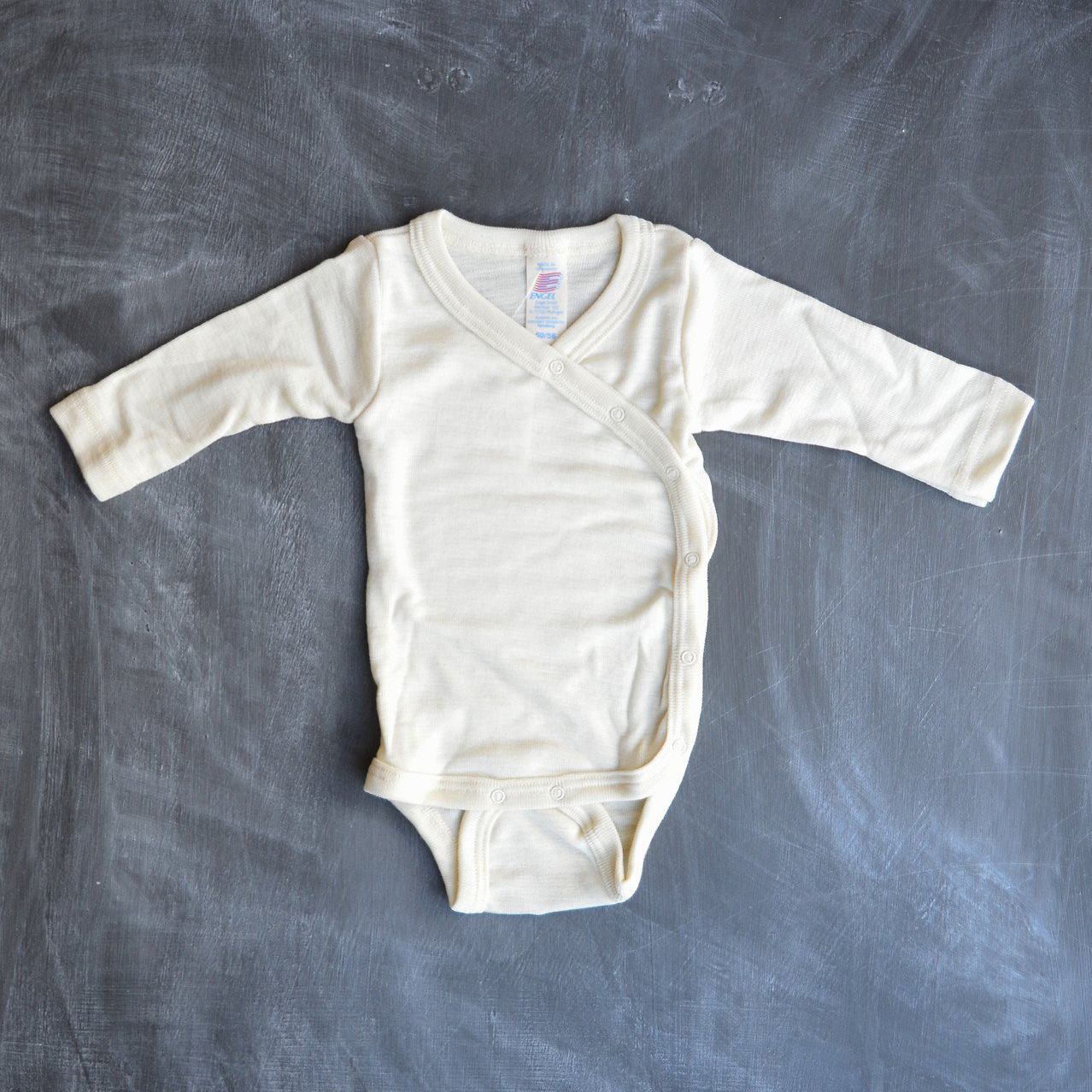 ENGEL Bodysuit dài tay vạt xéo 70% Merino wool 30% Silk Natural