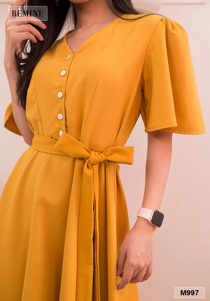 M997VANG - Đầm tay loe đính cúc trắng