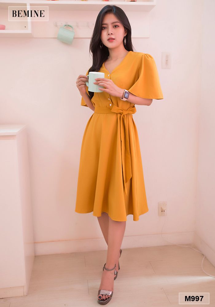 M997VANG - Đầm tay loe đính cúc trắng