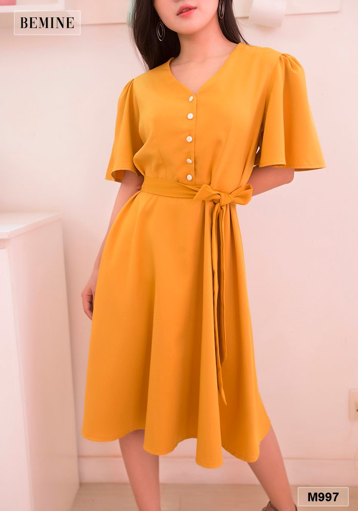 M997VANG - Đầm tay loe đính cúc trắng