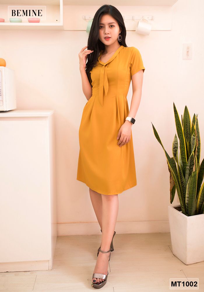 MT1002VANG - Đầm vàng tùng xoè cột dây nơ cổ