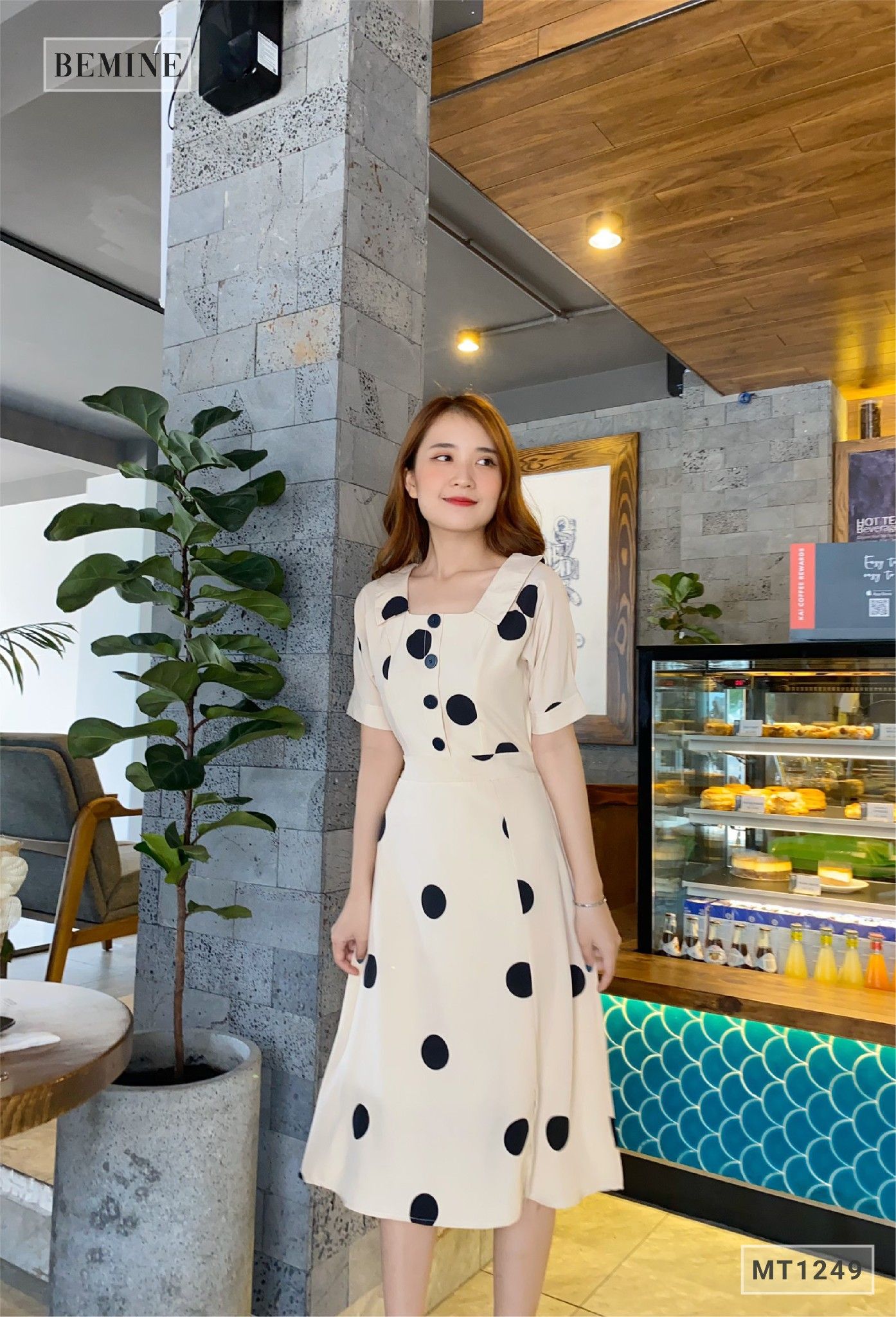 MT1249DA - Đầm chấm bi đính nút dọc