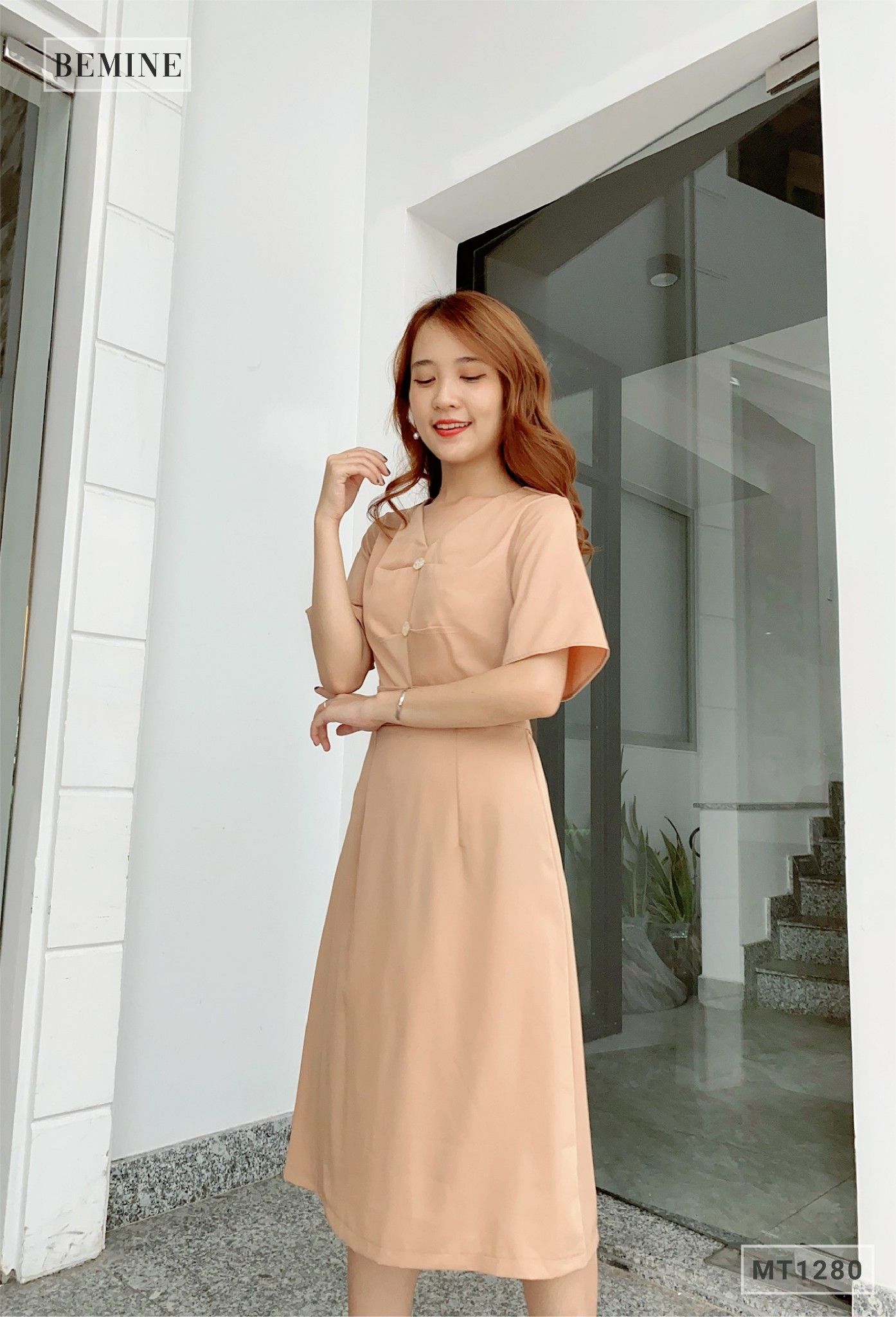 MT1280DA - Đầm xếp ly thân đính nút tay loe