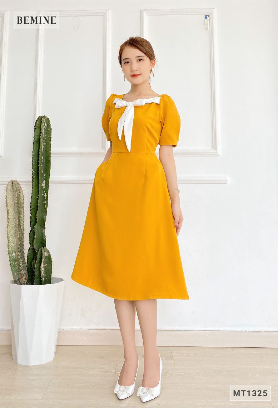 MT1325VANG - Đầm tay phồng nơ cổ