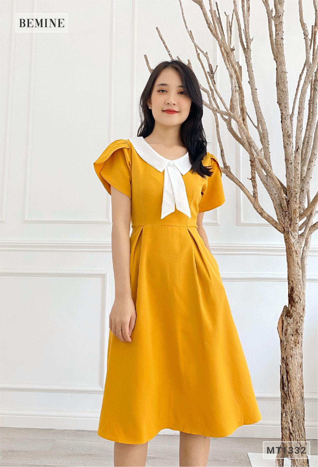 MT1332VANG - Đầm xòe cổ phối có nơ