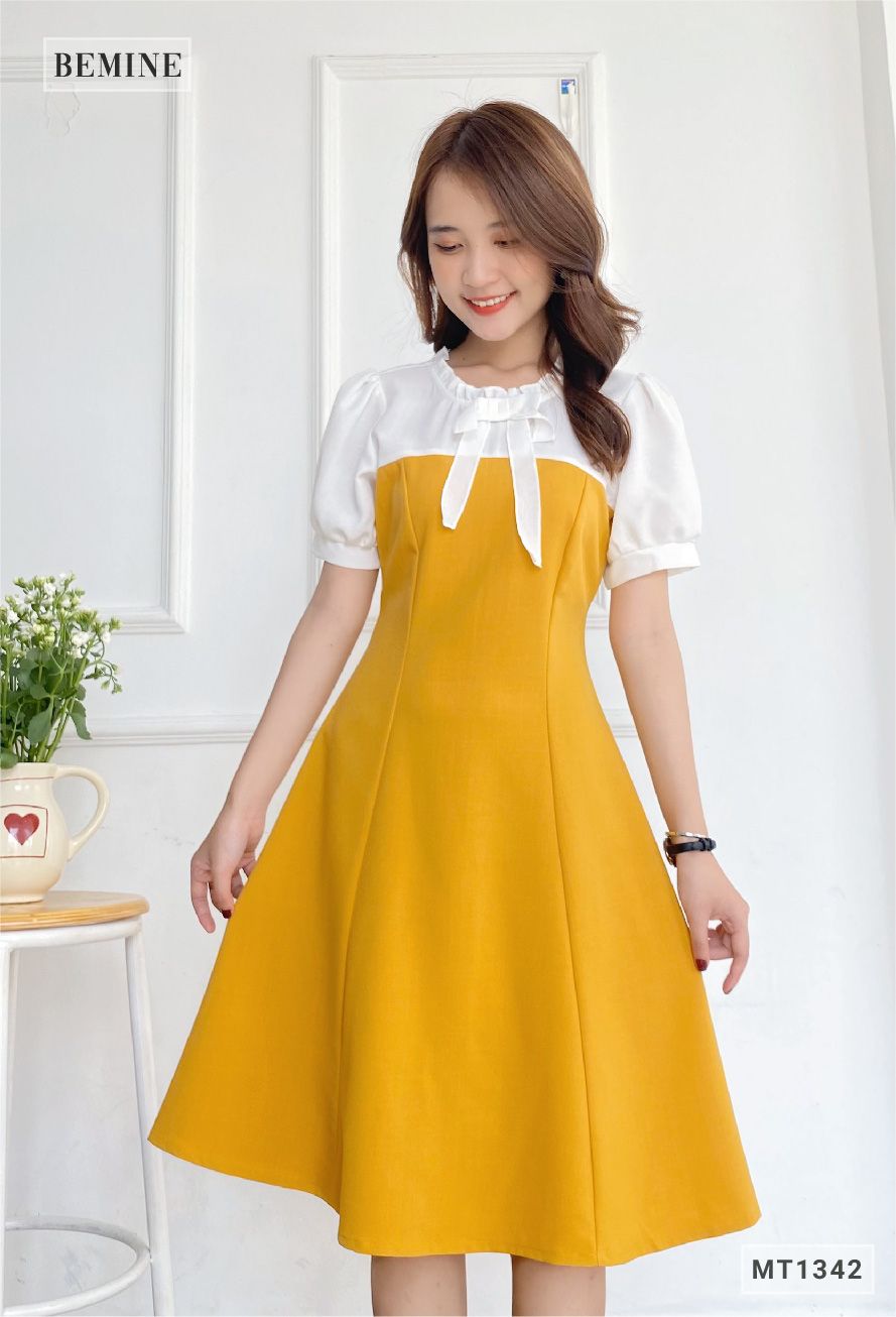 MT1342VANG - Đầm phối cổ tay có nơ