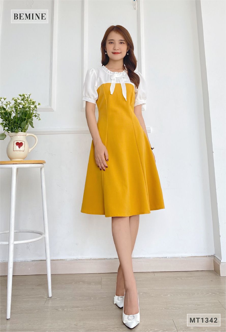 MT1342VANG - Đầm phối cổ tay có nơ