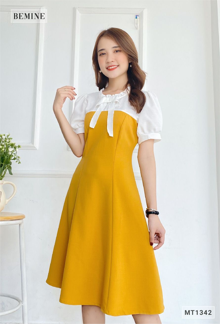 MT1342VANG - Đầm phối cổ tay có nơ