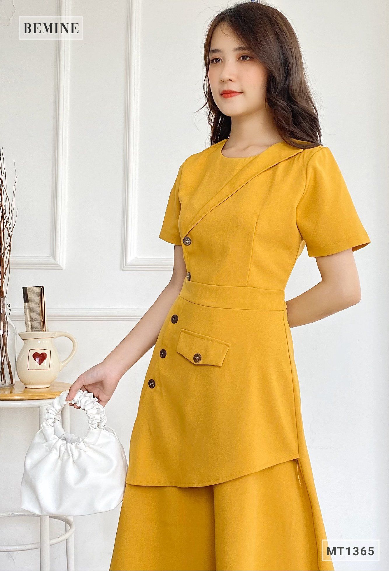 MT1365VANG - Đầm vạt xéo đính nút