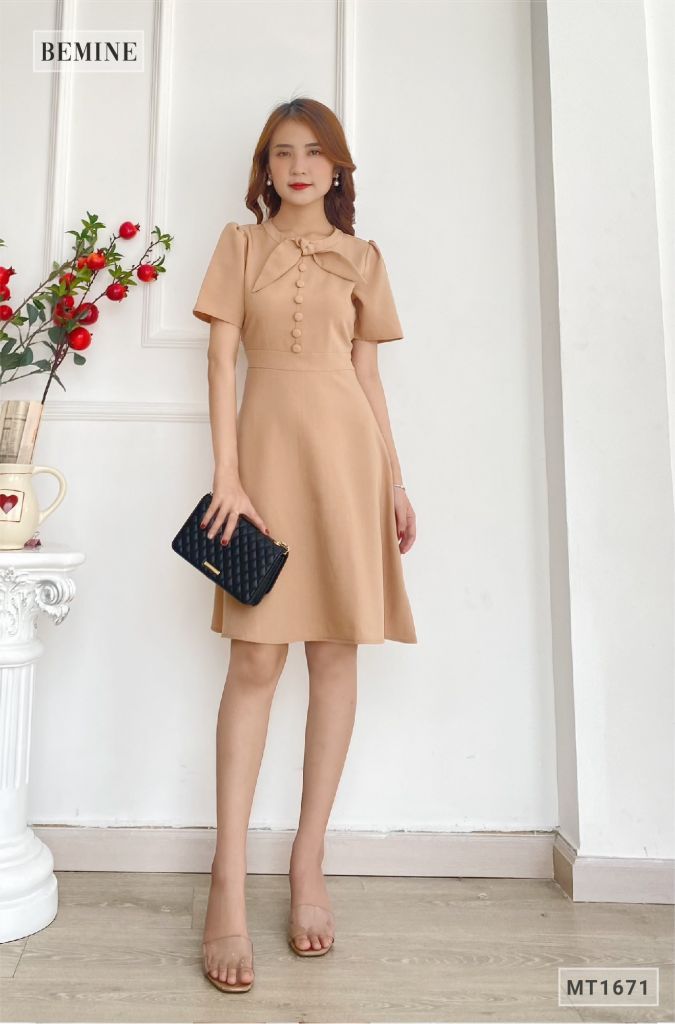 MT1671DA - Đầm trụ nút nơ cổ đắp chéo