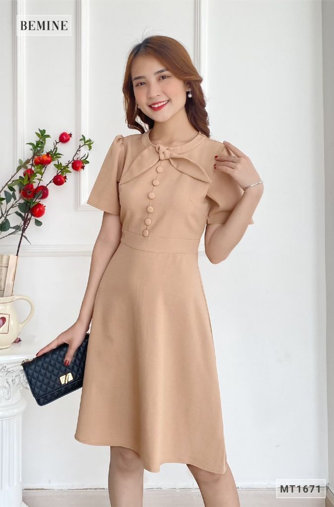 MT1671DA - Đầm trụ nút nơ cổ đắp chéo