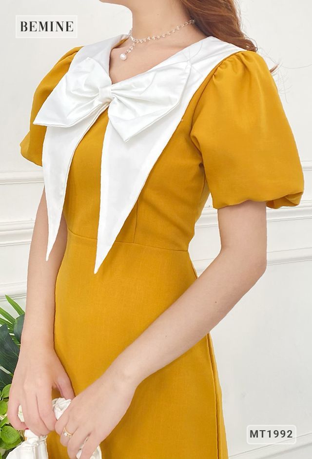 MT1992VANG - Đầm cổ nơ lớn tay bồng