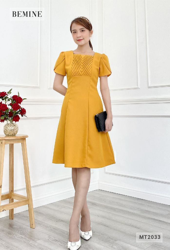 MT2033VANG - Đầm sếp ly ngực tùng xòe
