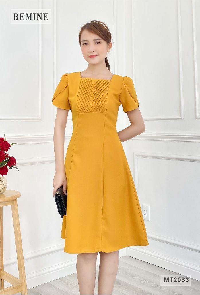 MT2033VANG - Đầm sếp ly ngực tùng xòe
